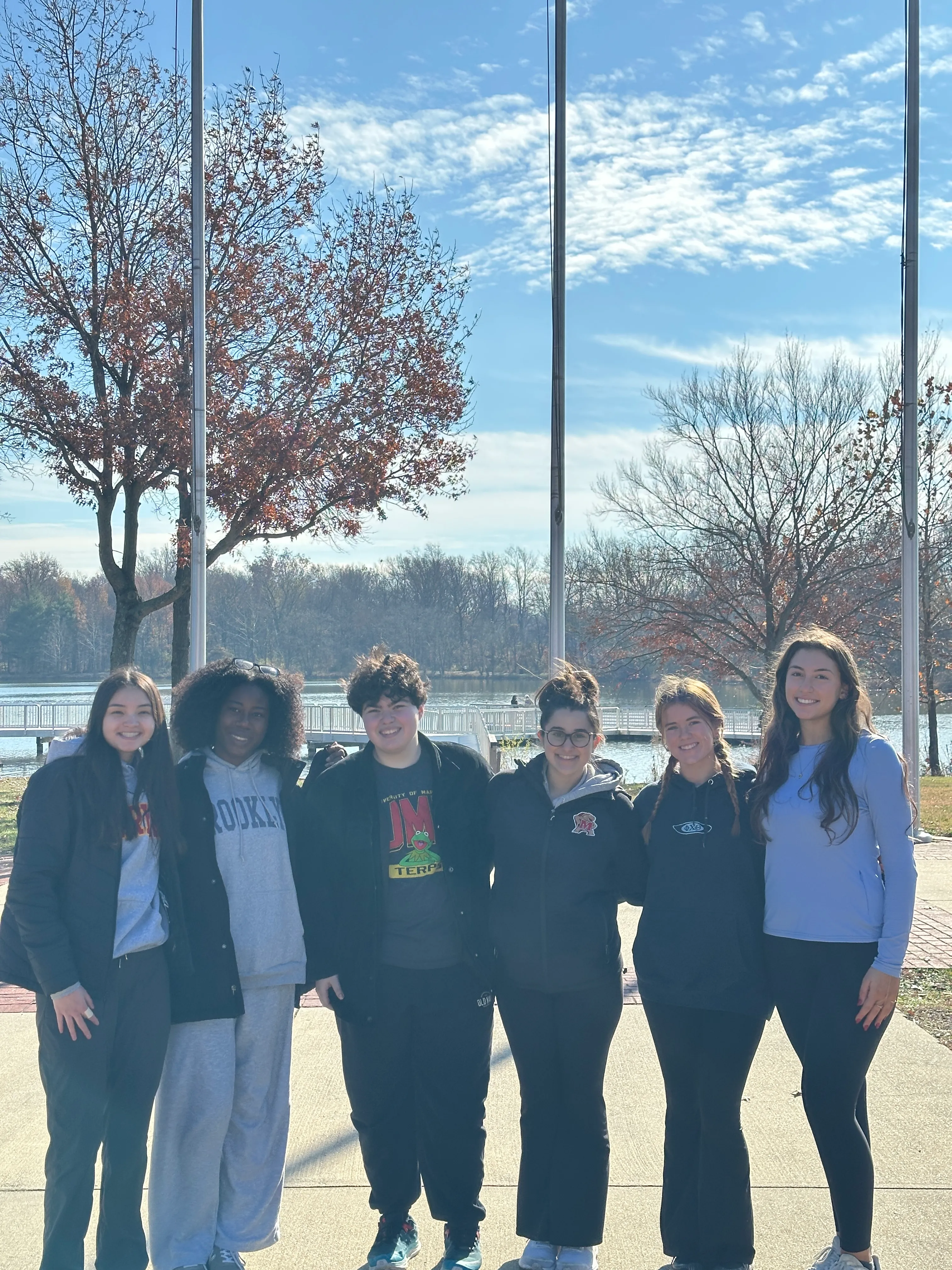 Maia Johnson, Uzochi Njiaju, Alyssa Manchester, Ava Petrilli, Molly Panepento, and Nour Farah at Lake Artemesia after the Chester Brandon Memorial 5K.