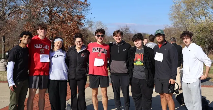 A group of Delta Sigma Pi members gathered at Lake Artemesia on race day.